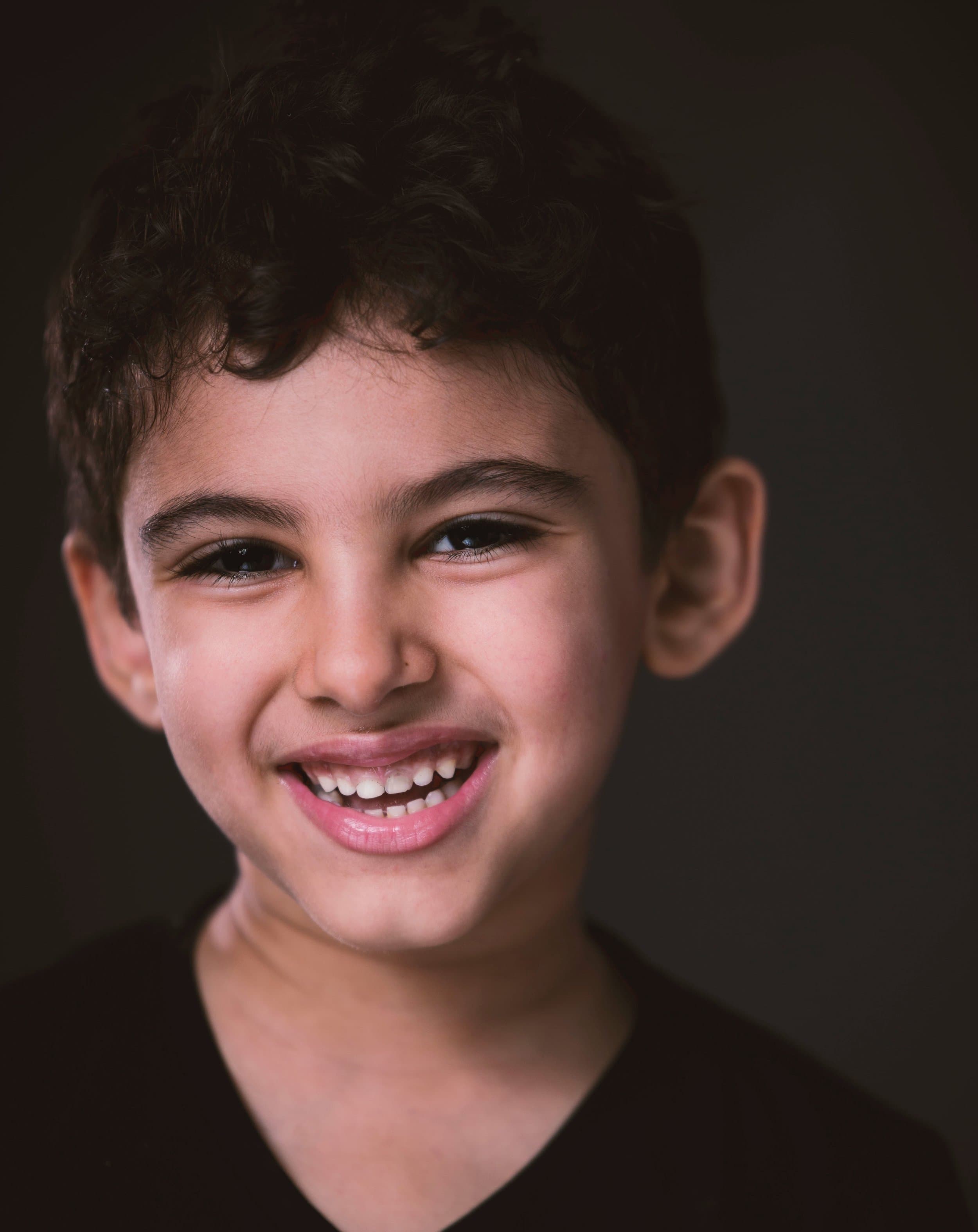 A child with a healthy, confident smile after Invisalign First treatment at Align Dental Surgery