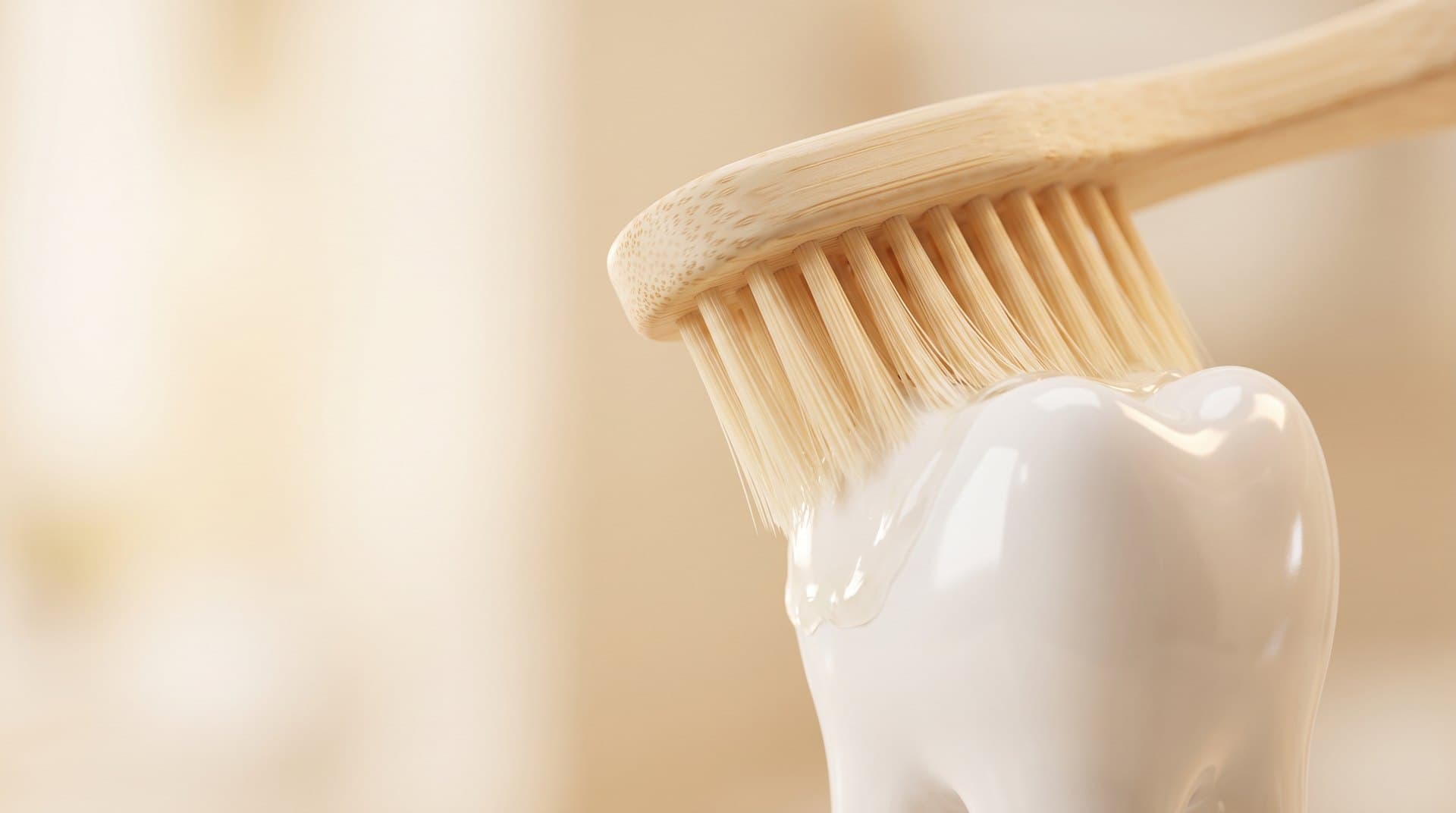 A soft-bristled toothbrush gently cleaning a glossy white tooth, suggesting removal of plaque