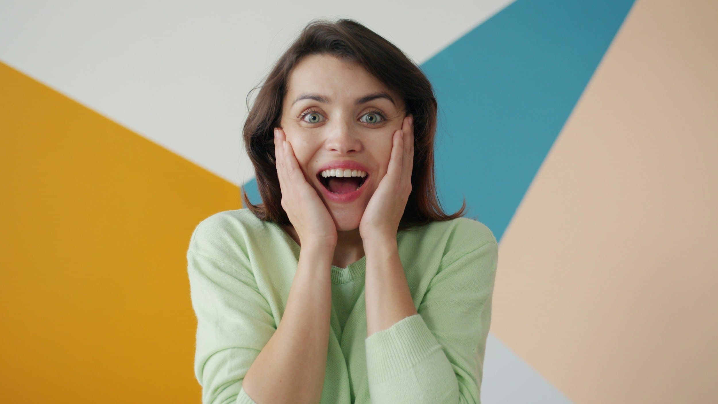 A close-up side profile of a smiling mouth with healthy teeth, reflecting the mild tooth sensitivity that can occur at each new expander stage, at Align Dental Surgery