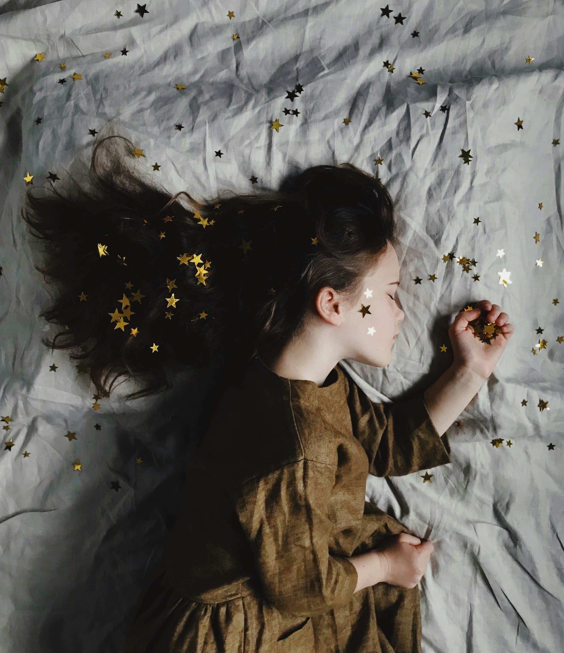 A young child asleep in bed, reflecting the restless sleep that can signal sleep apnea in children and teens, at Align Dental Surgery