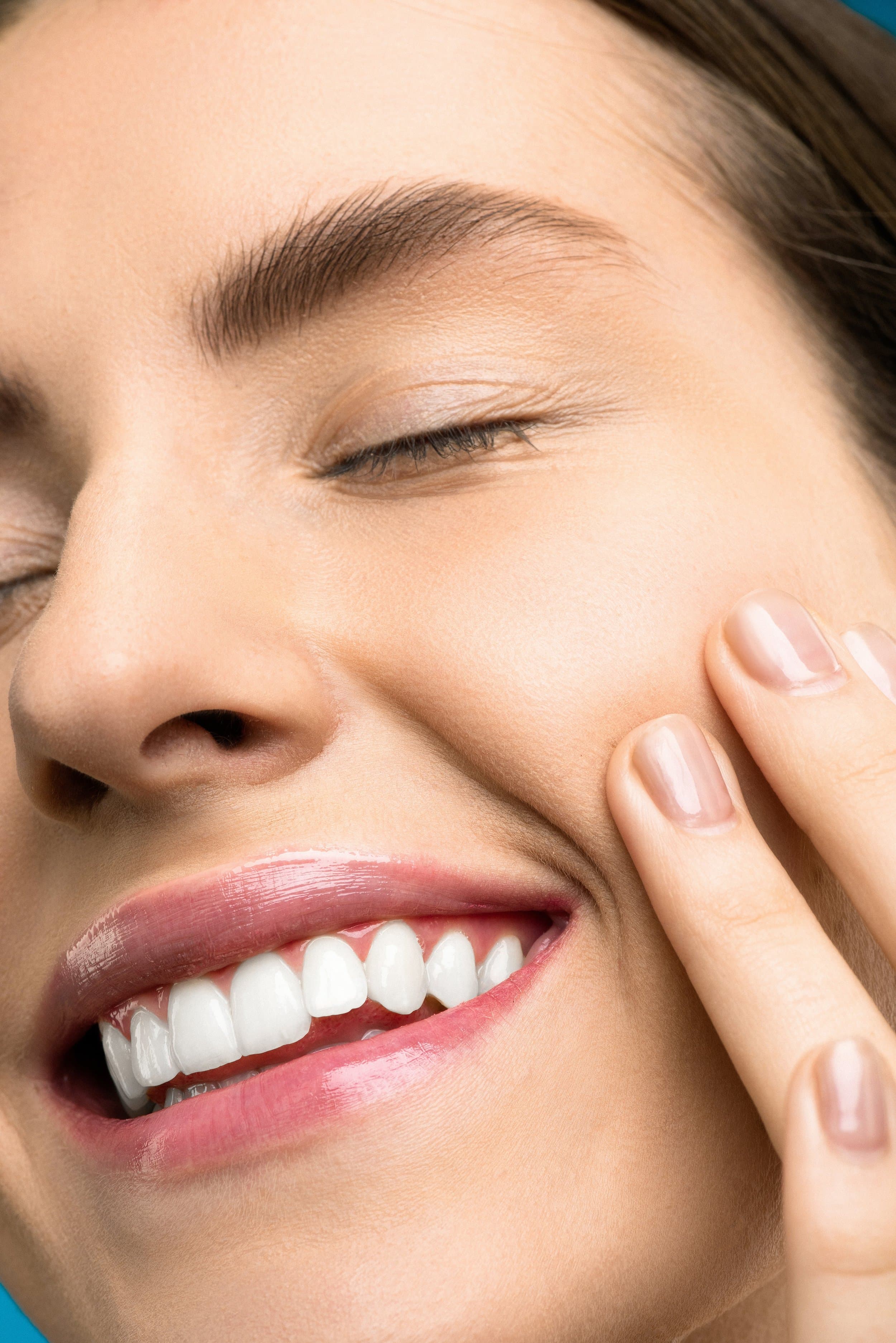 A woman smiling, illustrating take-home teeth whitening at Align Dental Surgery